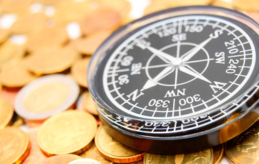 Compass on coins.