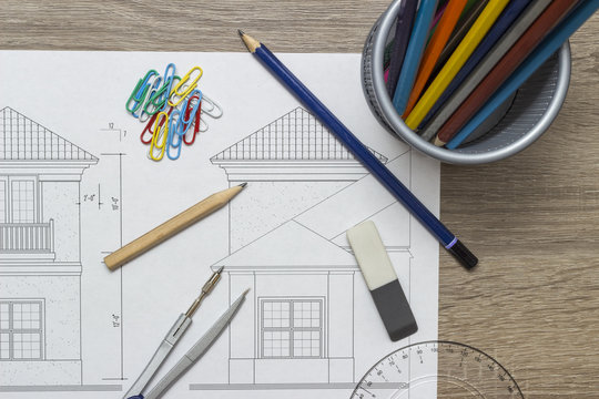 Blueprints and pencils