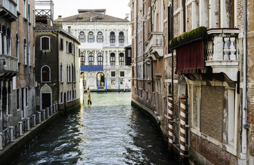 Ancient buildings in the channel in Venice.