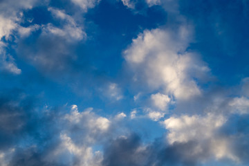 Naklejka na ściany i meble Beautiful clouds on a blue sky as background