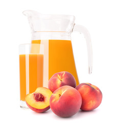 Peach fruit juice in glass jug