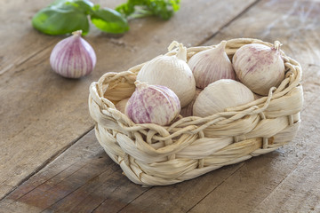 garlic cloves in a basket