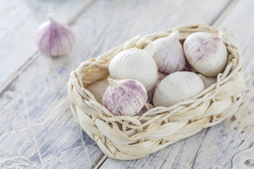 garlic cloves in a basket