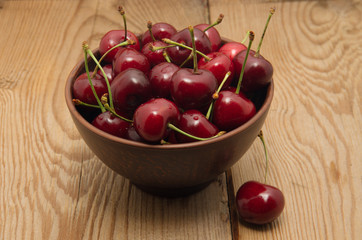 Cherries on wooden table