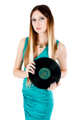 Pretty girl holding vinyl disc