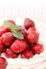 Strawberries in white whipped cream