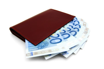 Money in a purse. On a white background .