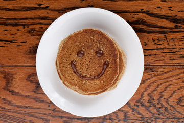 Wholesome whole wheat pancakes with a caramel sauce good morning smile