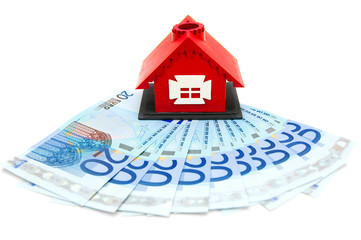 Money and the toy house.