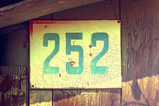Vintage house number two hundred fifty-two