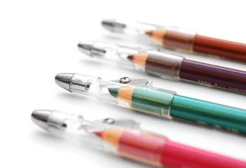 Cosmetic pencils. On a white background.