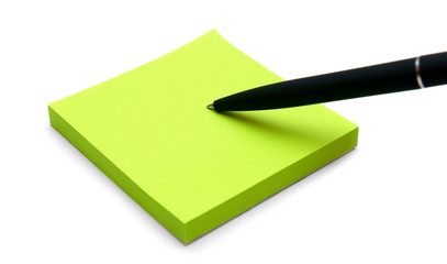 Stickers and pen on a white background .