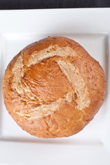 Circle artisan bread loaf fresh from the oven