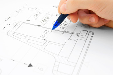 drawing and hand with pencil.