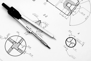 Compasses and the drawing.