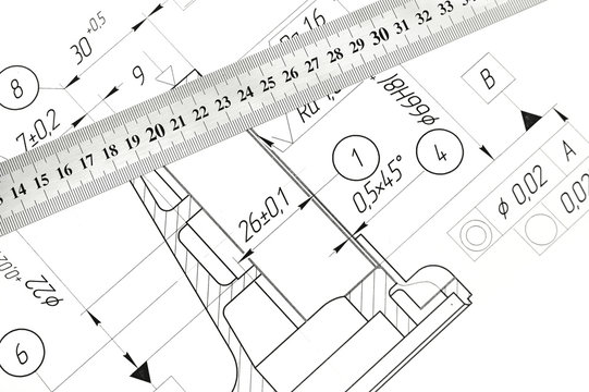 The drawing and ruler.