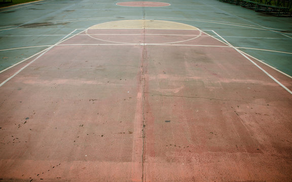 old outdoor basketball court floor