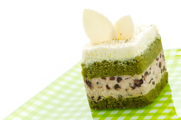 Matcha green tea cake isolated on white background