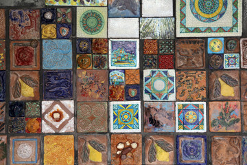 Italy, Cinque Terre, Riomaggiore. Decorative tiles on wall