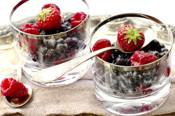 red fruits dessert with vintage silveware