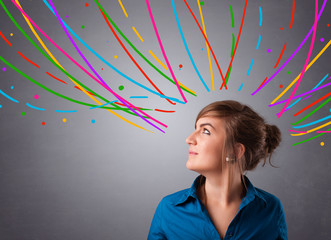 Young girl thinking with colorful abstract lines overhead