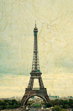 famous Eiffel Tower in Paris, France. Grunge style photo.