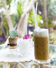 cool capuccino coffee on glass table use for food and beverage t