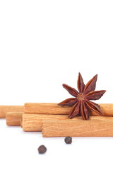 cinnamon sticks and anise isolated on a white