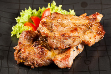 Grilled steaks and vegetables