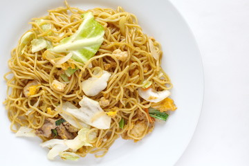 Chinese food stir - fried noodles with pork and vegetables