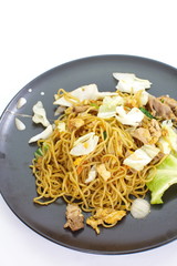 Chinese food stir - fried noodles with pork and vegetables