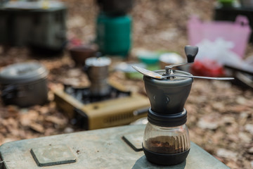 The coffee grinder for camping in the forest