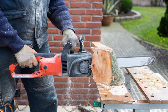 Chain Saw Cutting Wood