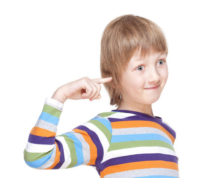 Boy in Colorful Shirt Pointing Finget to his Head