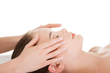 Fototapeta na wymiar Relaxed woman enjoy receiving face massage