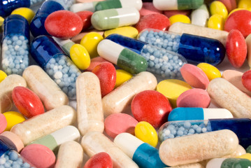 Color pills and capsules background