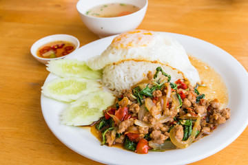 Stir fried pork with basil and egg