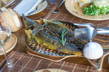 Fried sturgeon served on a plate