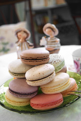 close up many color macaroon in coffee shop