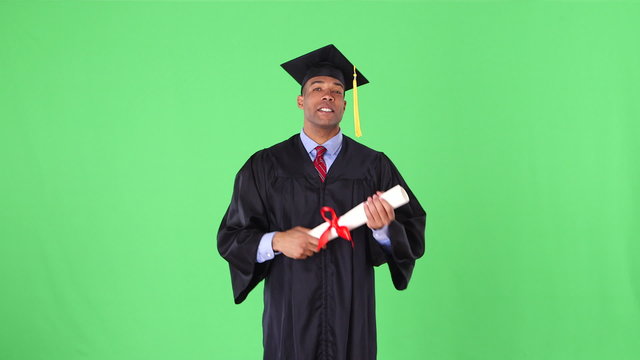 African American man with graduation gown and diploma