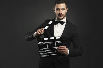 Man holding a clapboard