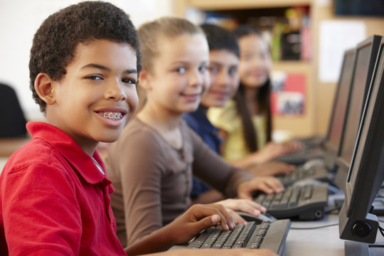 Schoolchildren working on computers