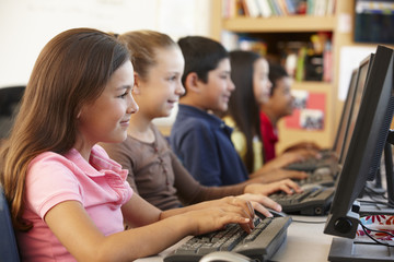Schoolchildren working on computers