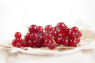 red currants on brown paper