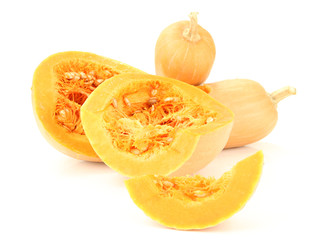 Ripe cut pumpkins isolated on white
