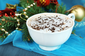 Hot chocolate with cream in color mug,