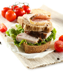 Delicious sandwiches with meet isolated on white