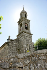 Fototapeta na wymiar Campanario de una iglesia en Galicia, España
