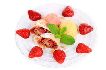 Tasty homemade strudel with ice-cream, fresh strawberry and