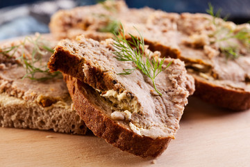 Slices of bread with baked pate - obrazy, fototapety, plakaty